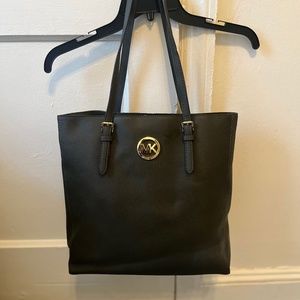 Black Michael Kors Tote snap closure
